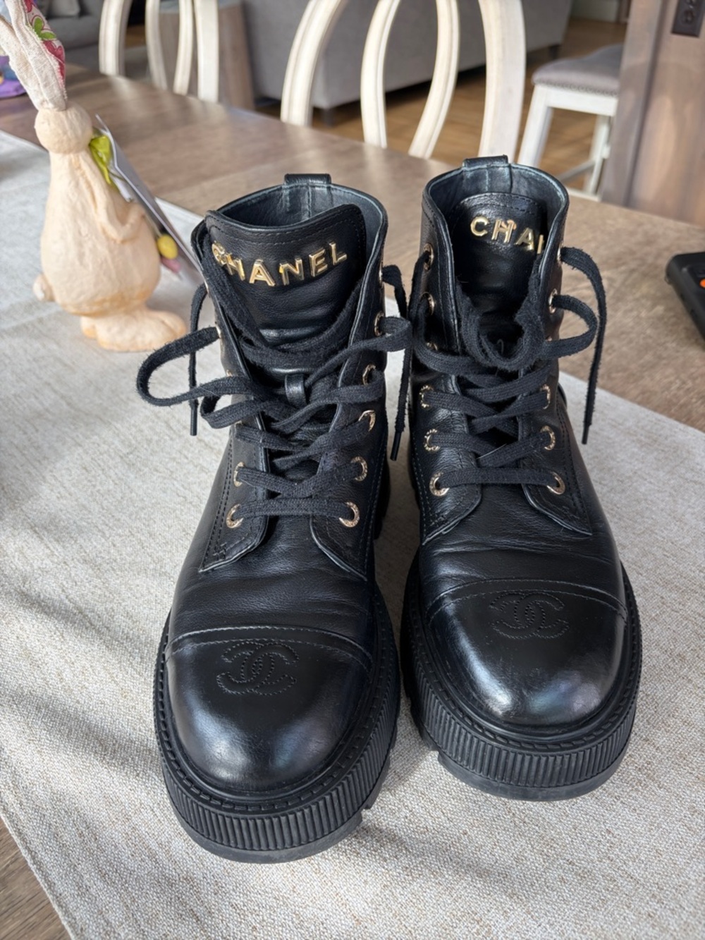 CHANEL Black Leather Lace-Up Platform Boots with Gold Hardware
